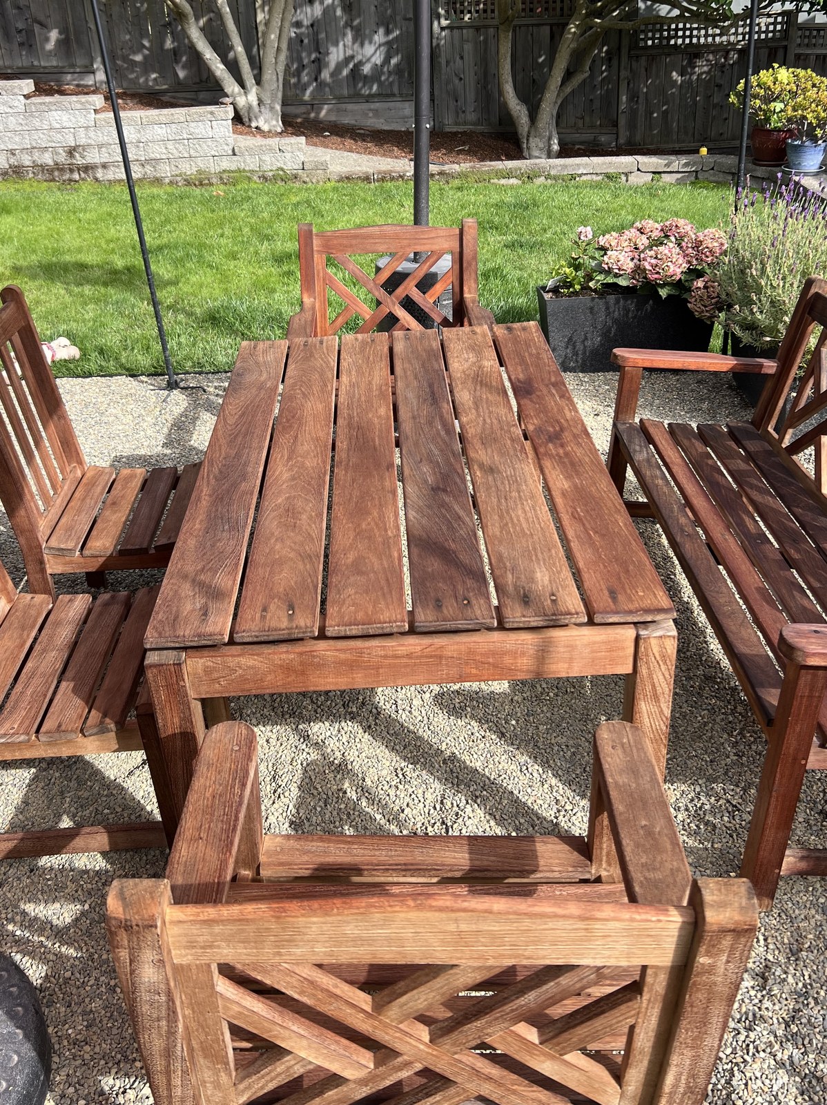 Same patio dining set restored to a warm golden tone