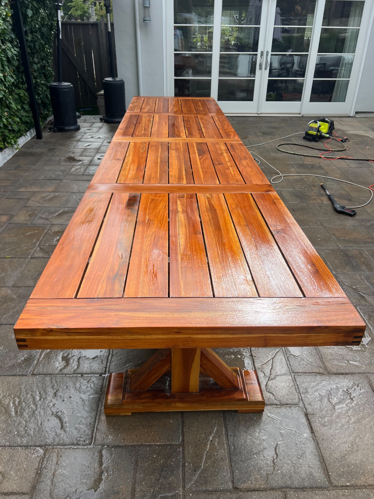 Same table stripped and cleaned, bare wood showing